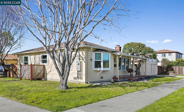 bungalow featuring covered porch and a front lawn