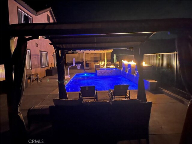 view of swimming pool featuring a patio area, fence private yard, an outdoor living space, and a pergola