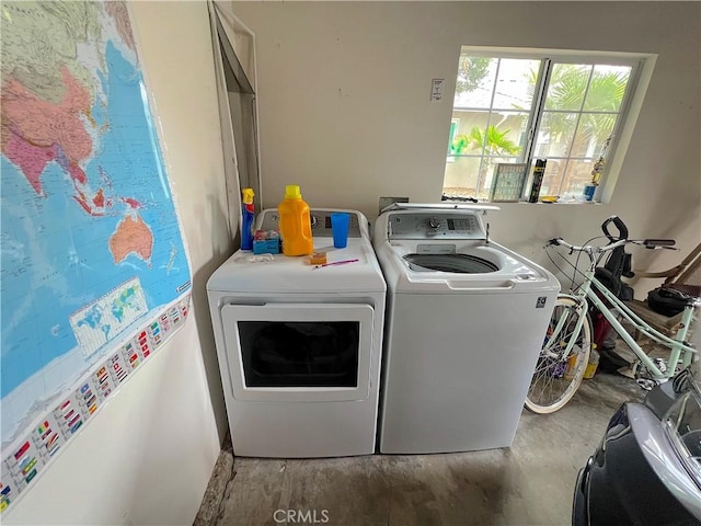 laundry room with washer and dryer