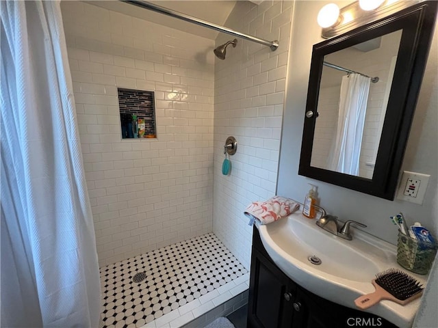 bathroom featuring vanity and walk in shower