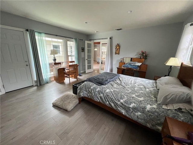 bedroom with light wood-type flooring