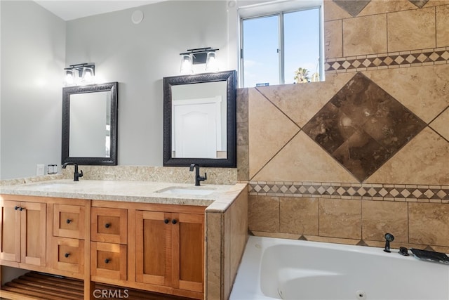 bathroom with vanity and a bathing tub