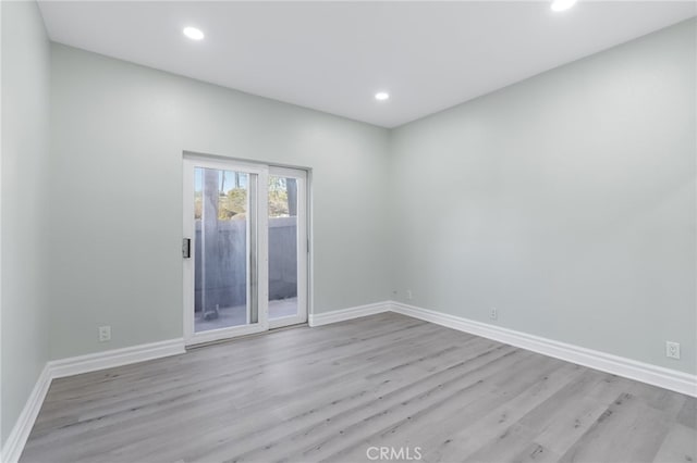 empty room featuring light hardwood / wood-style floors