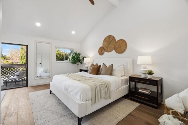 bedroom with ceiling fan, access to outside, high vaulted ceiling, and wood-type flooring