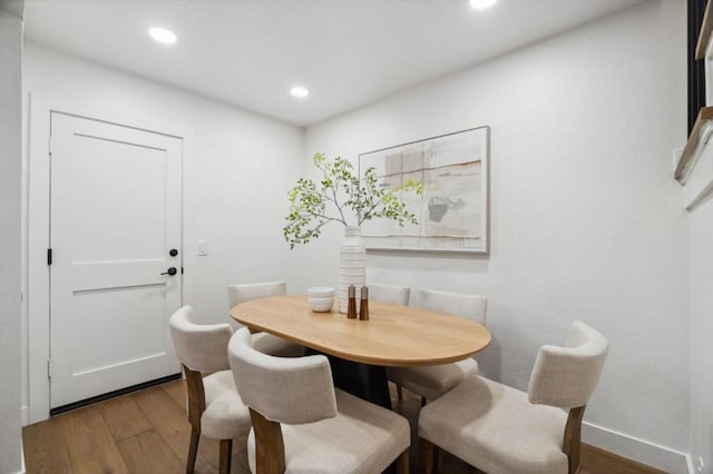 dining room featuring hardwood / wood-style flooring