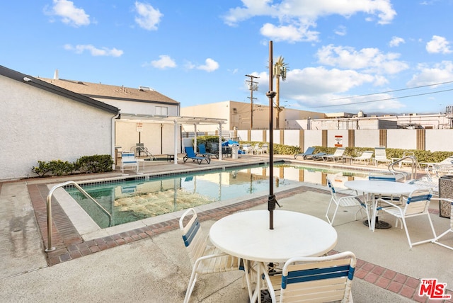 view of pool with a patio