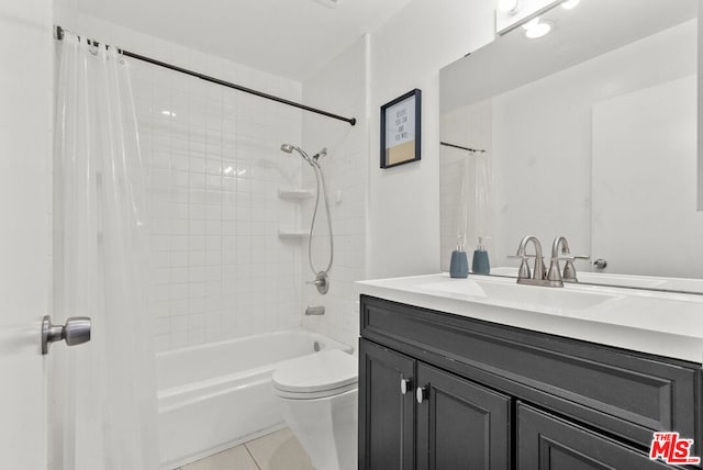 full bathroom with tile patterned floors, toilet, shower / tub combo, and vanity