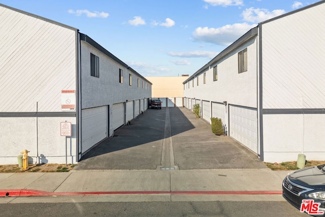 view of property exterior featuring a garage