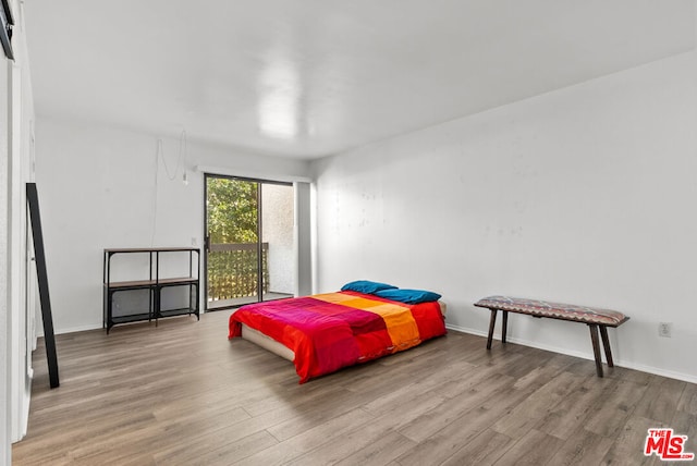 bedroom featuring light wood-type flooring