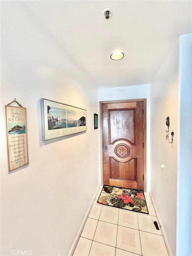 30 Camino De Flores Unit 71, Avalon, CA 90704 - doorway featuring tile patterned flooring and baseboards