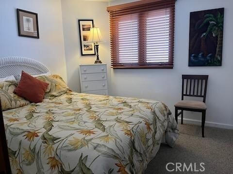 30 Camino De Flores Unit 71, Avalon, CA 90704 - carpeted bedroom with baseboards