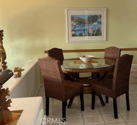 30 Camino De Flores Unit 71, Avalon, CA 90704 - dining area with light tile patterned floors and baseboards