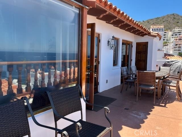 30 Camino De Flores Unit 71, Avalon, CA 90704 - view of patio / terrace with a mountain view and outdoor dining space