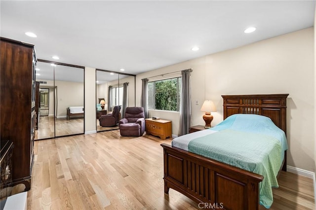 bedroom featuring light hardwood / wood-style floors