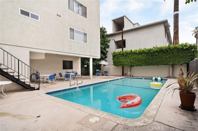 view of pool with a patio area