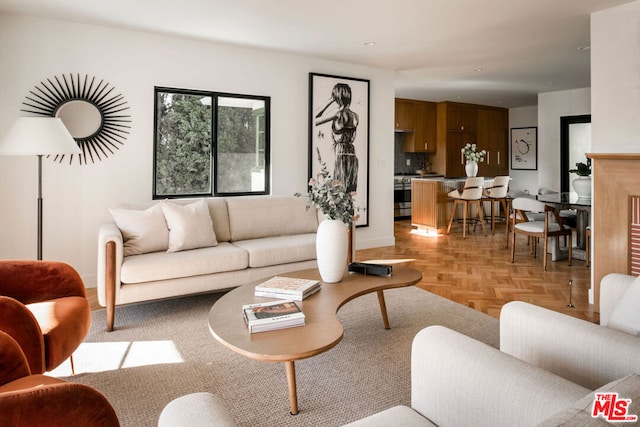 living room with light parquet floors