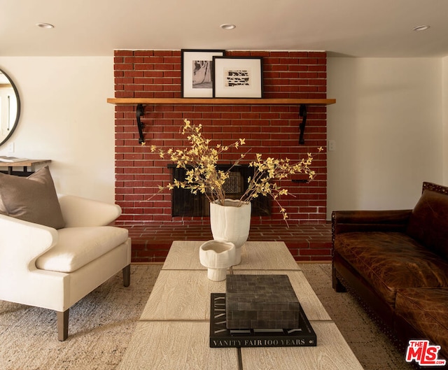 living room featuring a fireplace