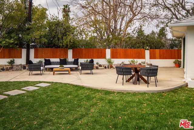 view of patio with an outdoor living space