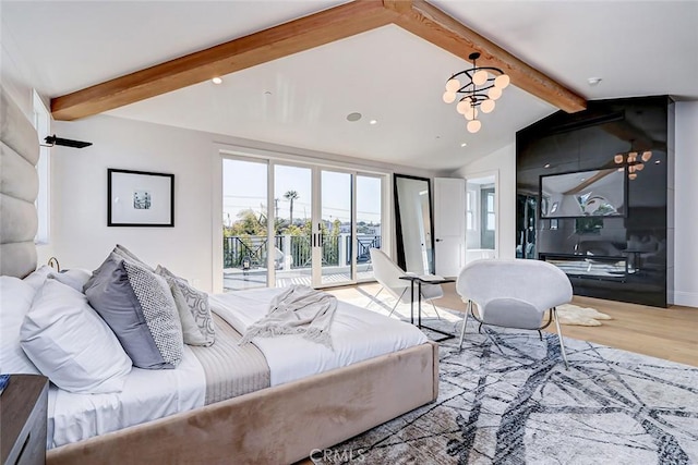 bedroom featuring vaulted ceiling with beams, access to exterior, and light hardwood / wood-style flooring