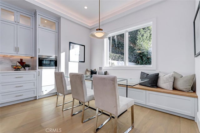 dining space featuring light hardwood / wood-style floors