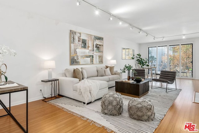 living room with hardwood / wood-style flooring