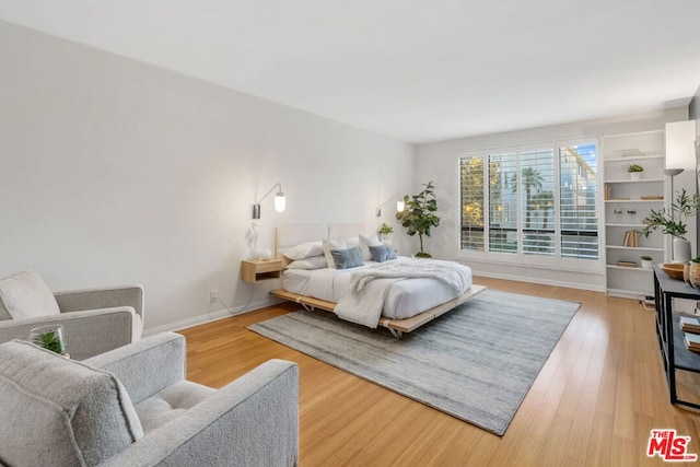 bedroom featuring hardwood / wood-style flooring