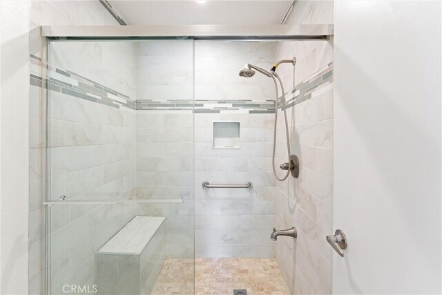 bathroom with an enclosed shower