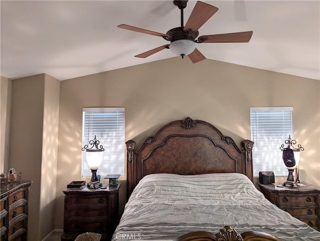 bedroom with lofted ceiling and ceiling fan