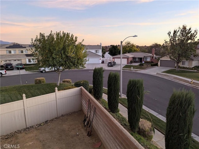 view of balcony at dusk