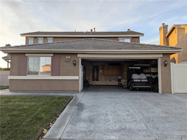 view of front of property with a garage