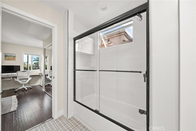 bathroom with wood-type flooring