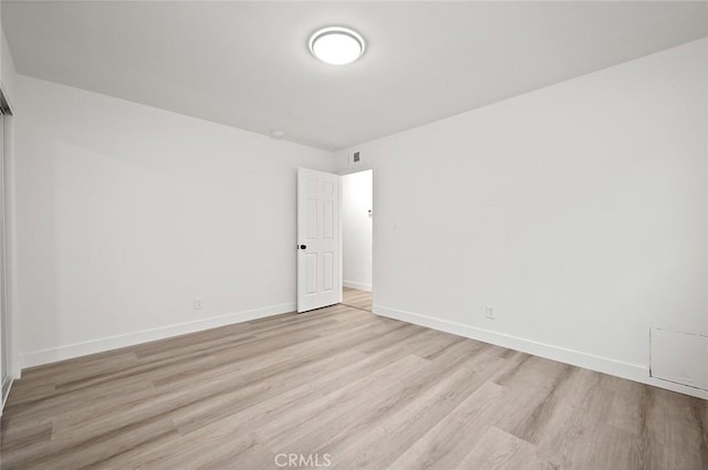 empty room featuring light hardwood / wood-style flooring