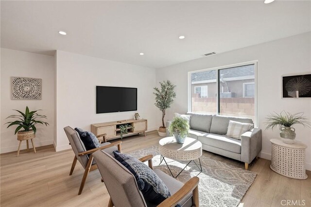 living room with light wood-type flooring