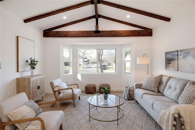 living room featuring vaulted ceiling with beams