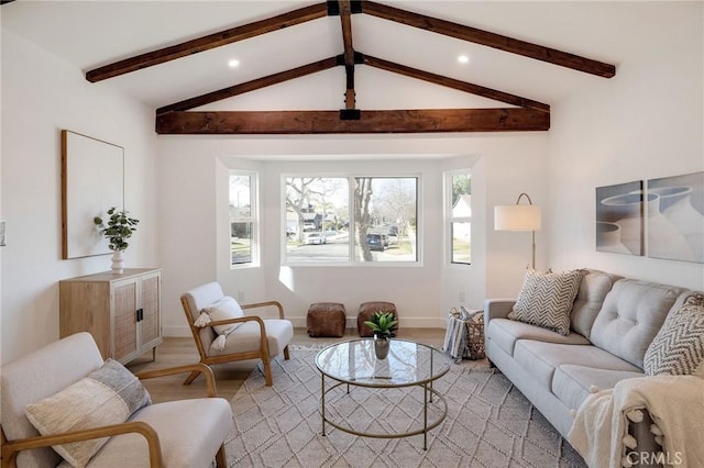 living area with lofted ceiling with beams, light wood-style floors, baseboards, and recessed lighting