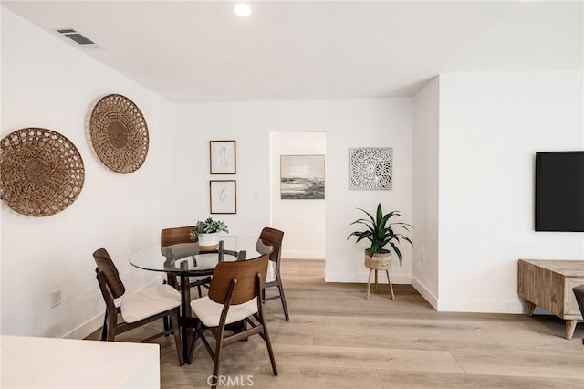 dining area featuring light hardwood / wood-style flooring