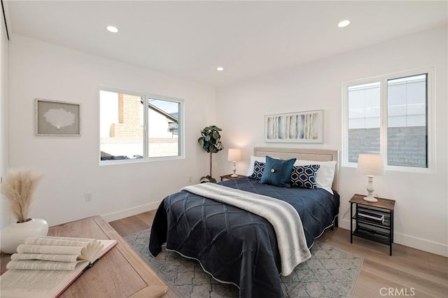 bedroom featuring light hardwood / wood-style flooring