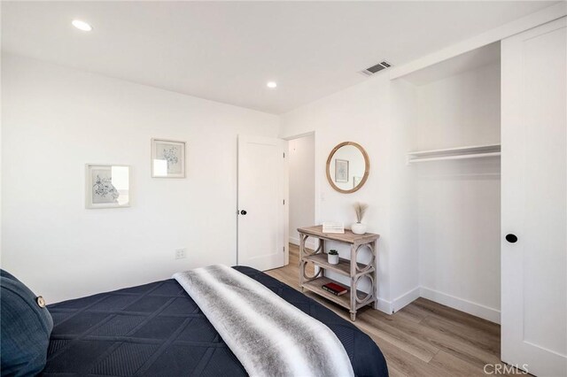 bedroom featuring light hardwood / wood-style flooring