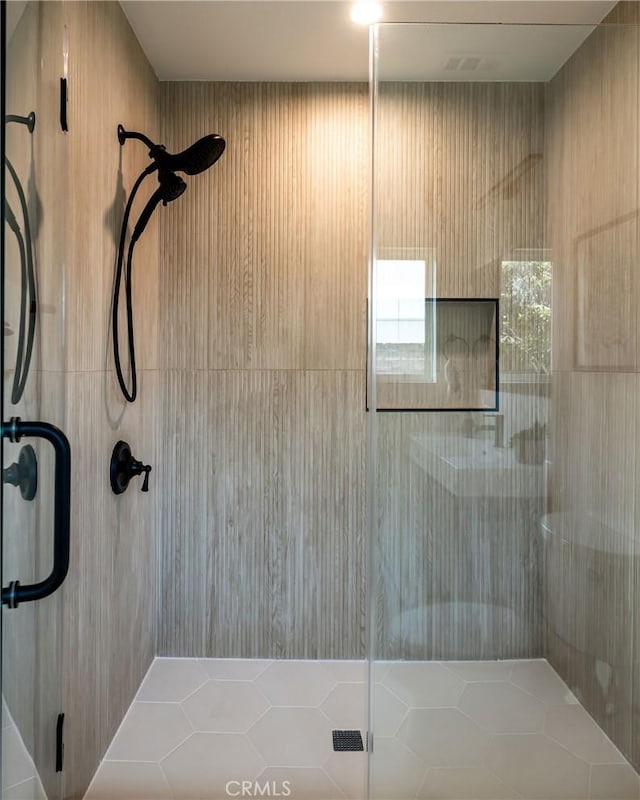 bathroom featuring a shower stall