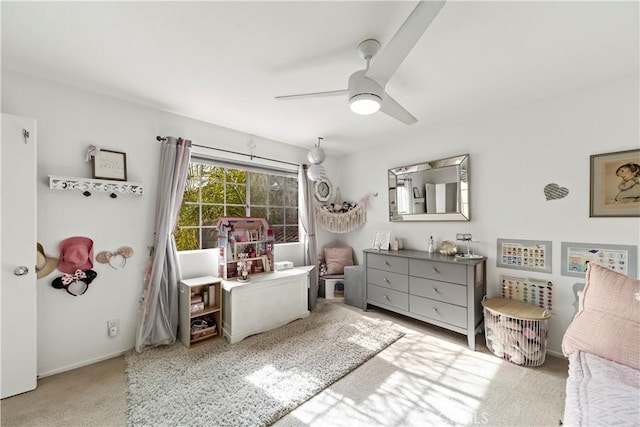 carpeted bedroom featuring ceiling fan