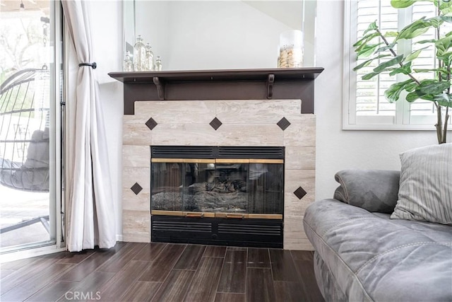 interior details with a tiled fireplace