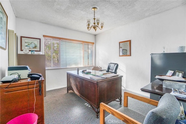 home office featuring a chandelier and a textured ceiling