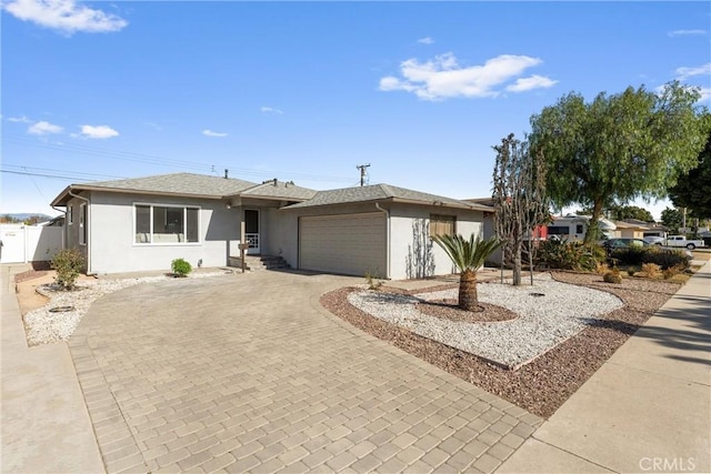 single story home featuring a garage