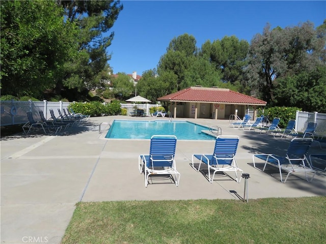 view of pool featuring a patio