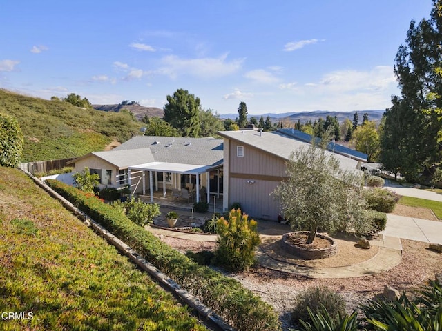 exterior space featuring a mountain view