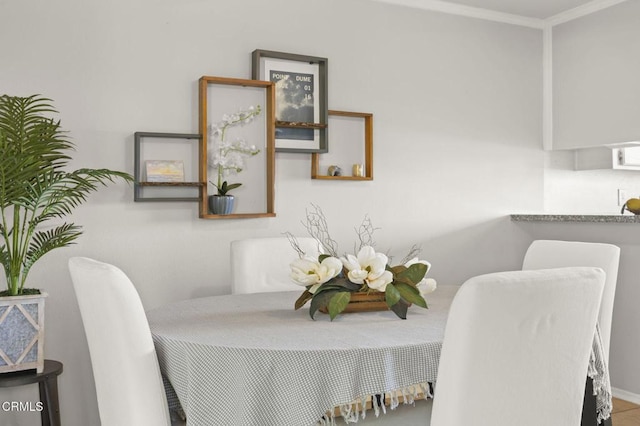 dining room with ornamental molding