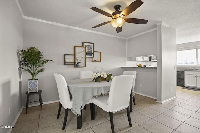 dining room with ornamental molding, light tile patterned flooring, and ceiling fan