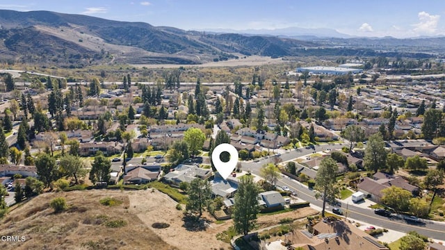 bird's eye view with a mountain view