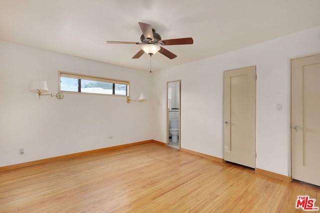 unfurnished bedroom with light wood-type flooring, connected bathroom, and ceiling fan