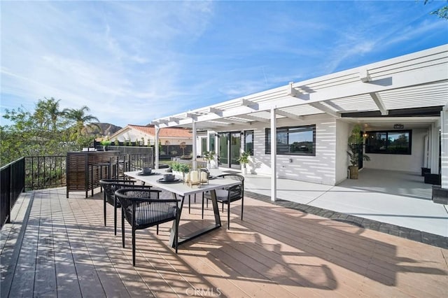 wooden terrace featuring a pergola and an outdoor bar